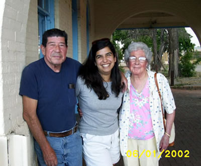 my grandparents and me at the train station